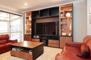 Black and spotted gum custom made entertainment unit with LED lighting