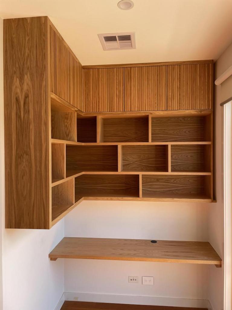 Corner desk and floating shelving