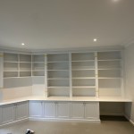 Corner Fitted White Shelving and Cupboards