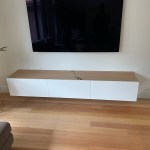 Custom white Entertainment Unit and oak top