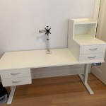 White height adjustable desk with drawers