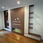 Custom laminate modern wall entertainment centre with fireplace